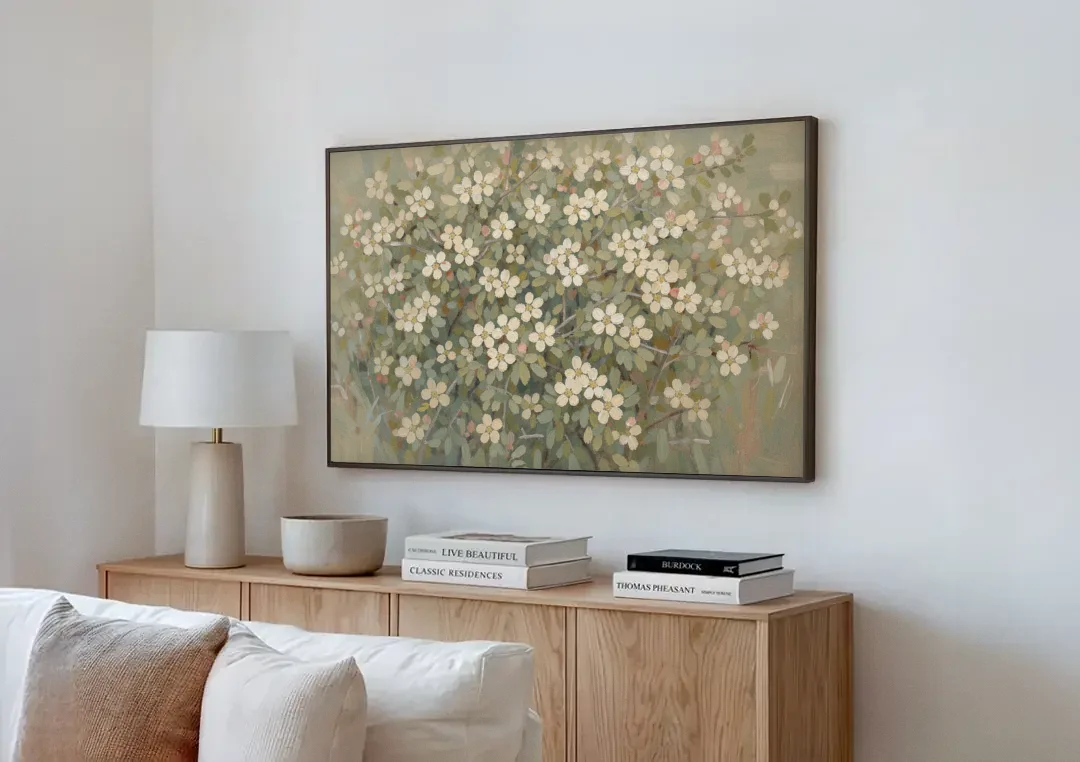 Sage Green Botanical Wall Art of Hedgerow Blossoms canvas wall art above a wooden sideboard next to a sofa