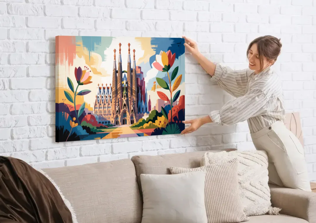 Sagrada Familia Splendor canvas wall art being hung on a white brick wall above a sofa