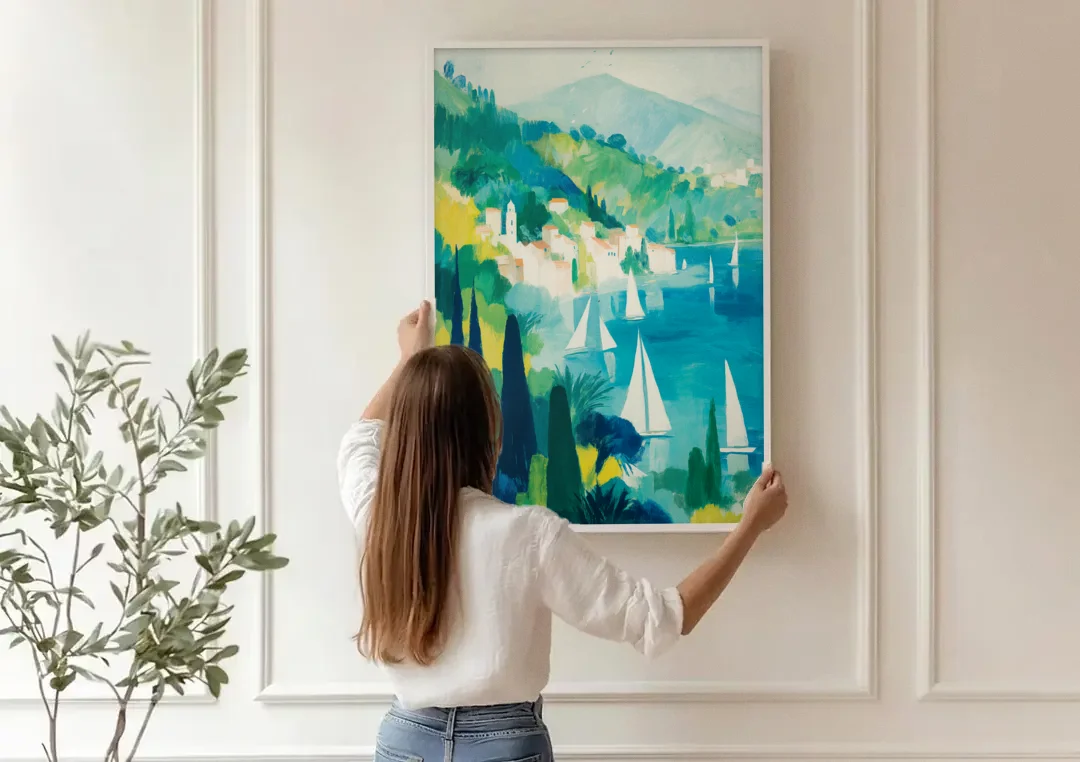 Sailboat Wall Art with Cypress Trees canvas wall art being hung on a paneled wall