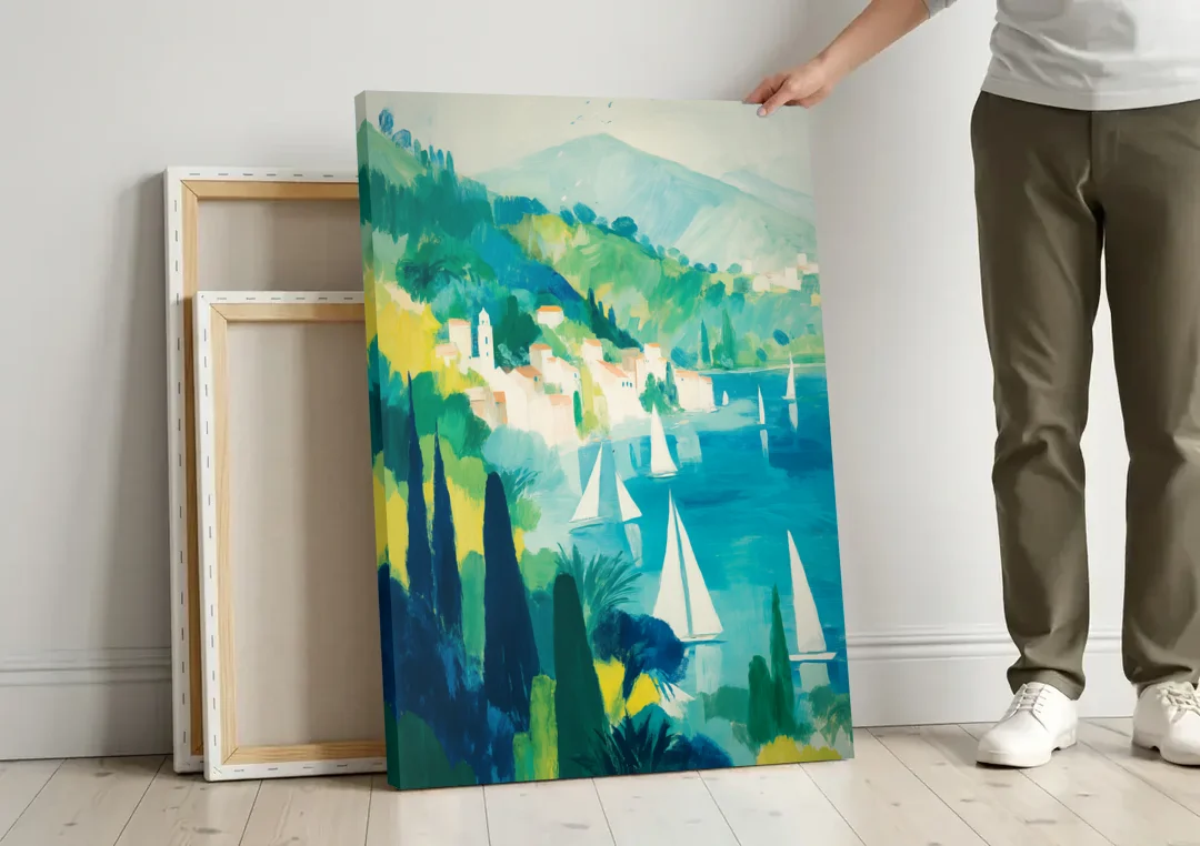 Sailboat Wall Art with Cypress Trees canvas wall art leaning against a wall next to blank canvases