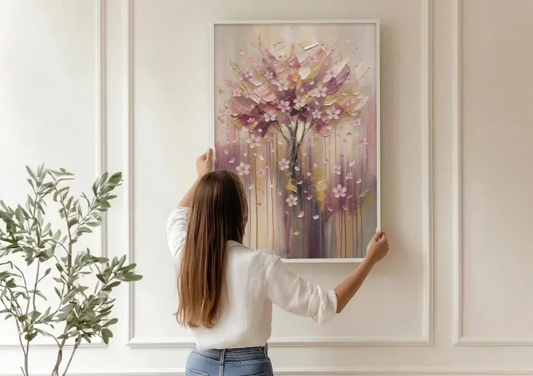Sakura Painting with Dripping Rose and Gold canvas wall art being hung on a paneled wall