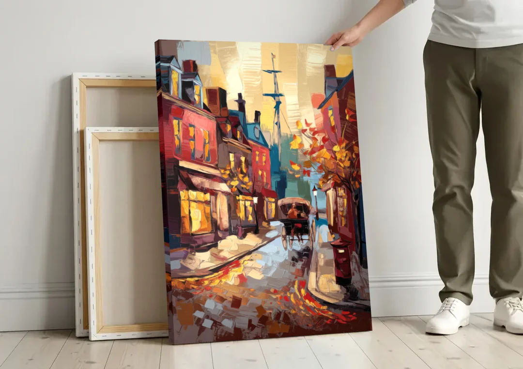 Salem New England Streets canvas wall art leaning against a wall next to blank canvases