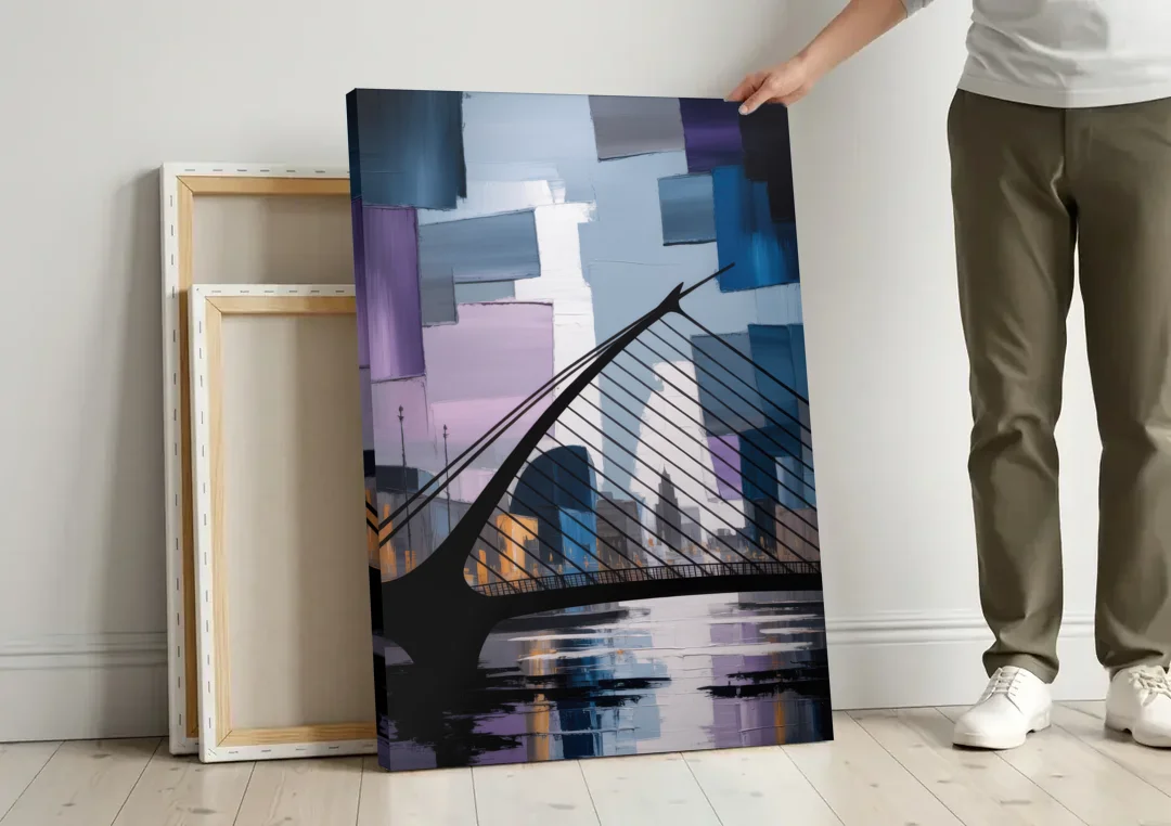 Samuel Beckett Bridge Silhouette canvas wall art leaning against a wall next to blank canvases