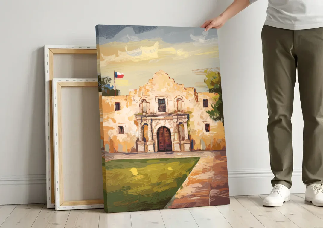 San Antonio Alamo Tribute canvas wall art leaning against a wall next to blank canvases