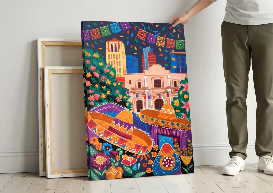 San Antonio Fiesta Colors canvas wall art leaning against a wall next to blank canvases