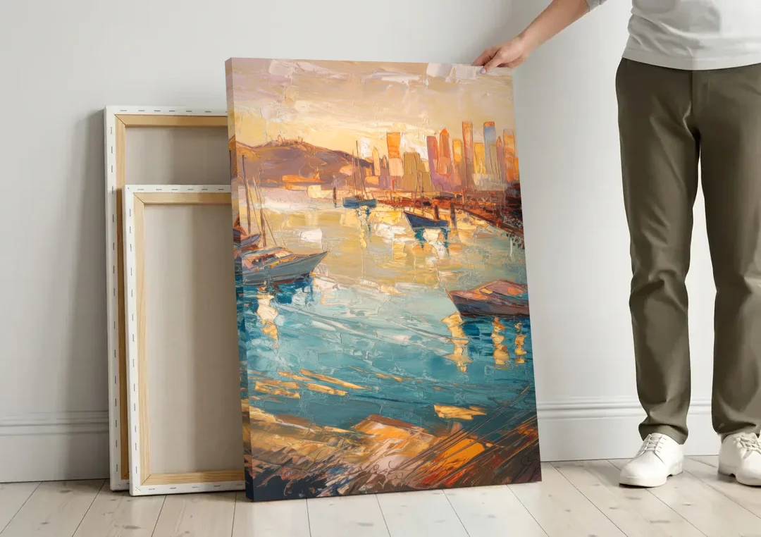 San Diego Harbor View Coastal canvas wall art leaning against a wall next to blank canvases