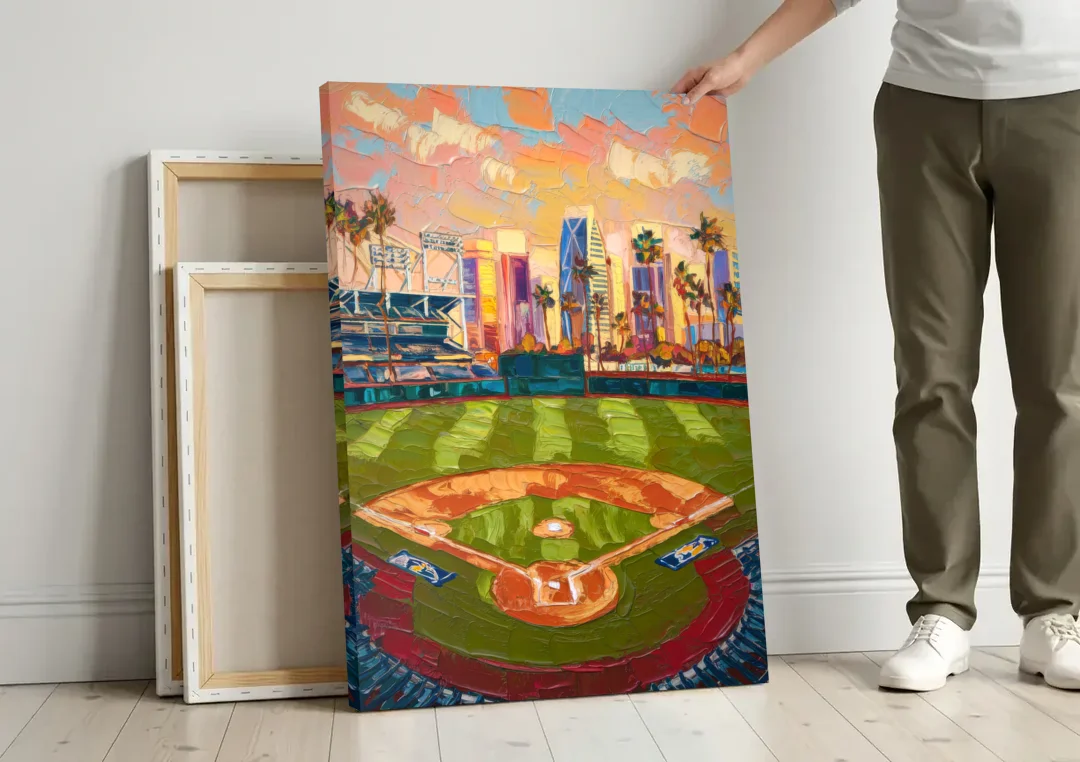 San Diego Padres Stadium canvas wall art leaning against a wall next to blank canvases