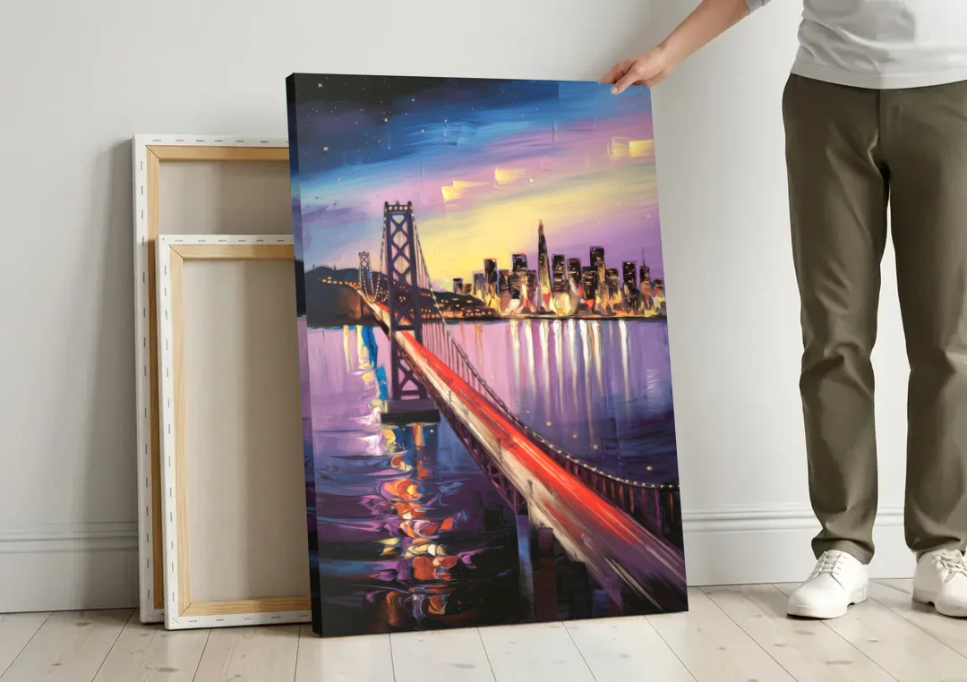 San Francisco City and Bay canvas wall art leaning against a wall next to blank canvases