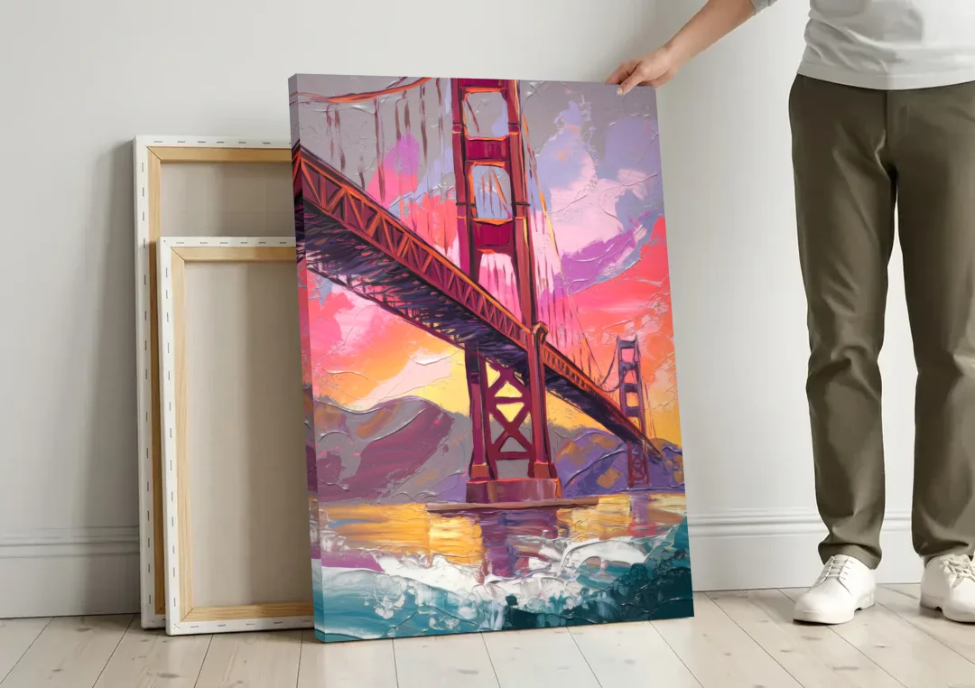 San Francisco Golden Gate Bridge canvas wall art leaning against a wall next to blank canvases
