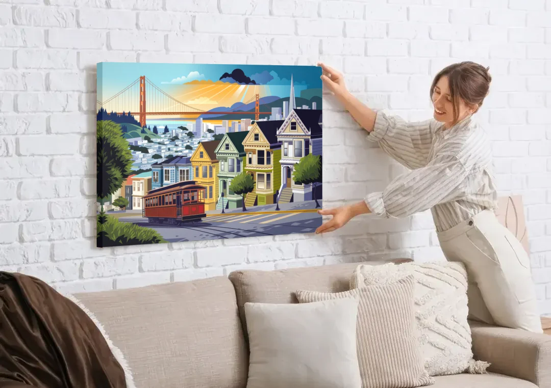 San Francisco Urban Landscape canvas wall art being hung on a white brick wall above a sofa