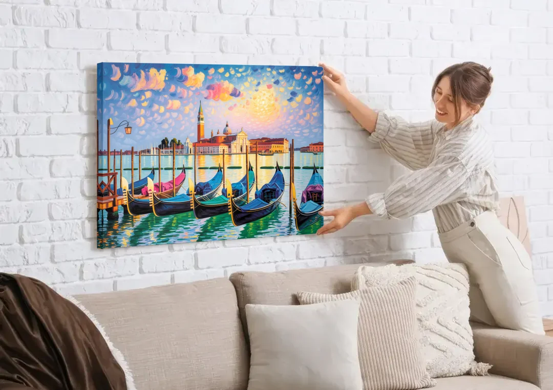 San Giorgio Maggiore View canvas wall art being hung on a white brick wall above a sofa
