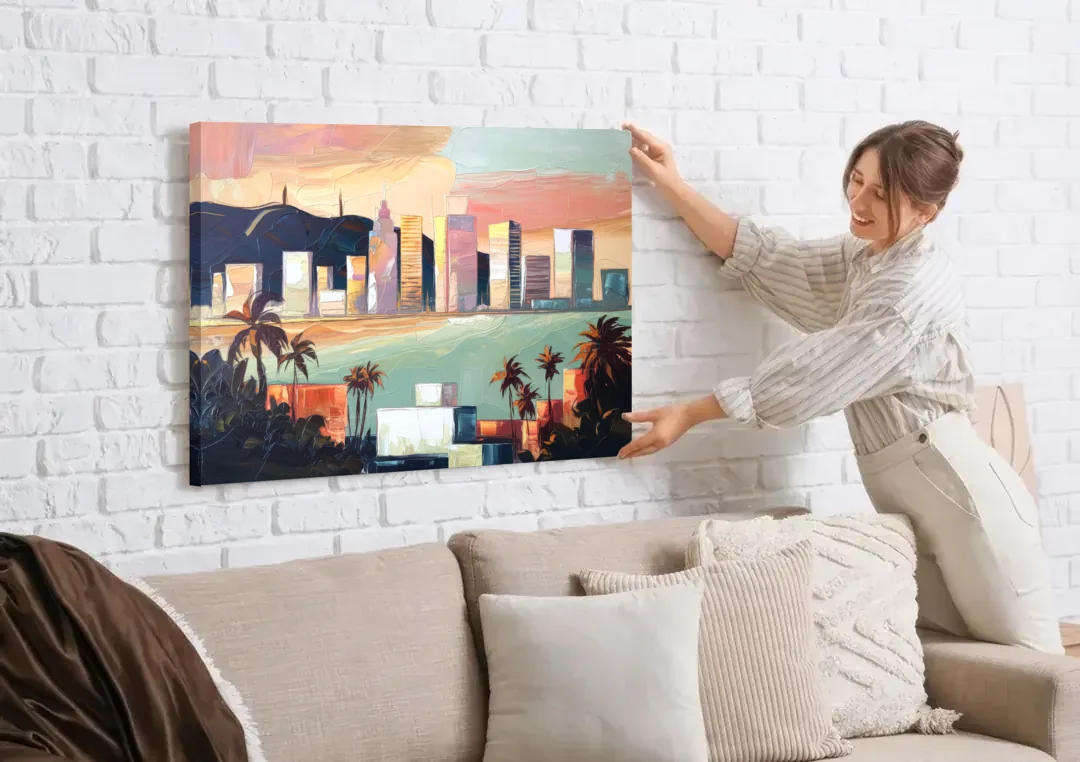 San Jose Downtown Skyline canvas wall art being hung on a white brick wall above a sofa