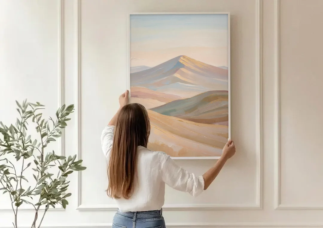 Neutral Sand and Sage Mountain Highlands canvas wall art being hung on a paneled wall