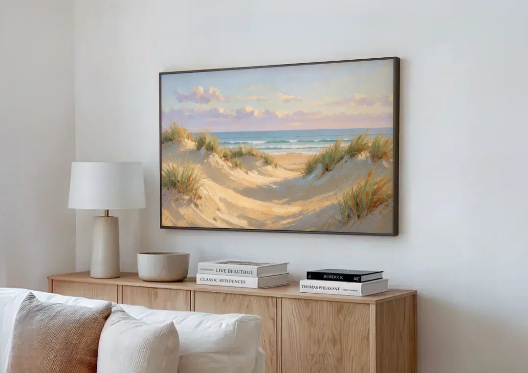 Sand Dunes and Beach Grass Under Lavender Clouds canvas wall art above a wooden sideboard next to a sofa