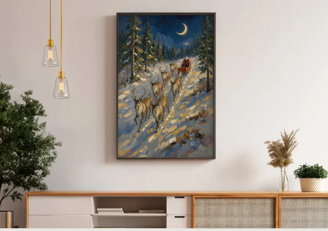 Santa and Reindeer Canvas Climbing to the Crescent Moon canvas wall art above a wooden sideboard under pendant lights