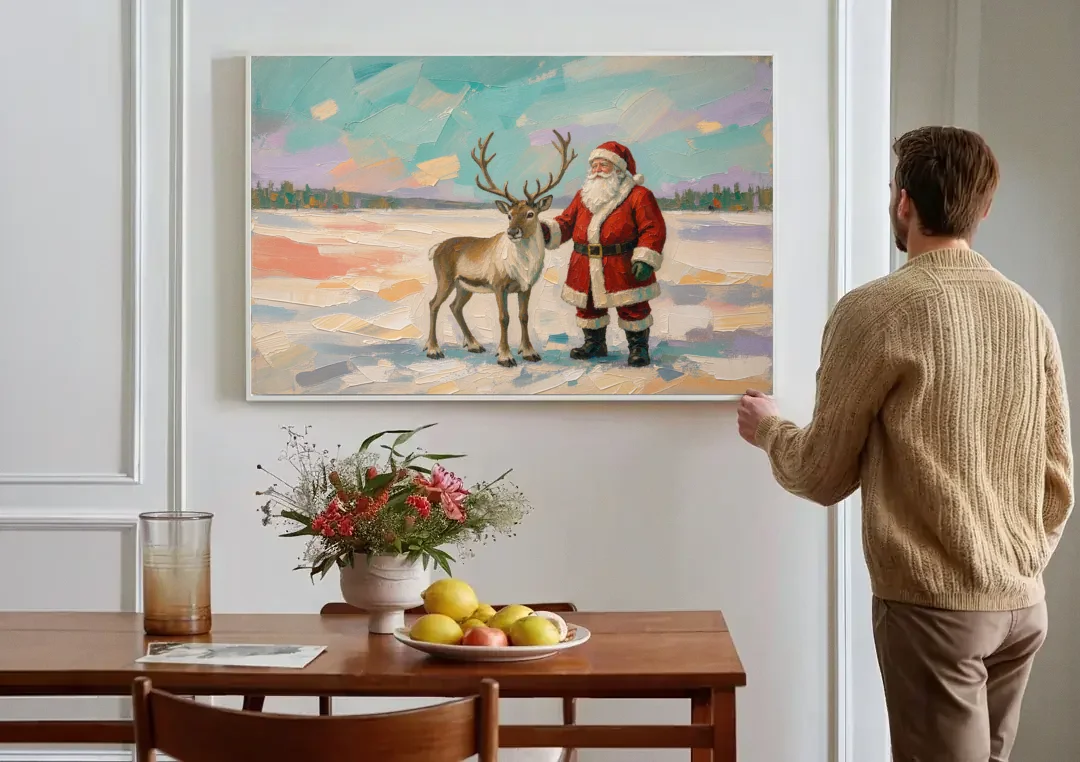 Santa and Reindeer Painting on the Open Snow canvas wall art above a dining table