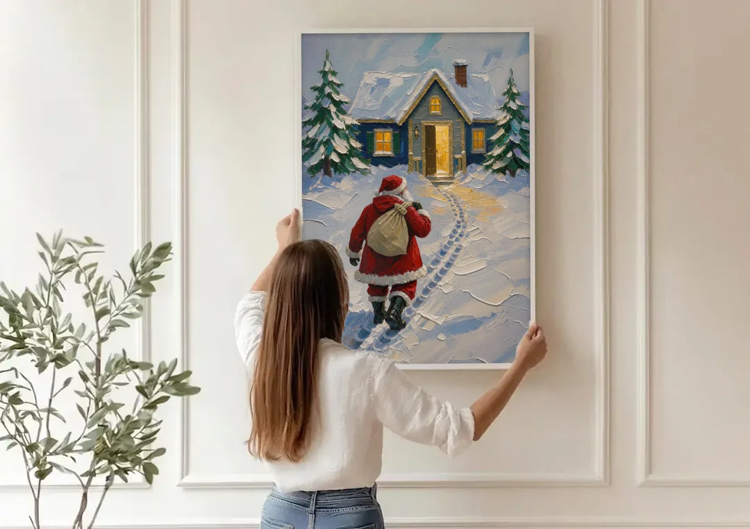 Santa Claus Canvas Art Footprints to the Golden Door canvas wall art being hung on a paneled wall