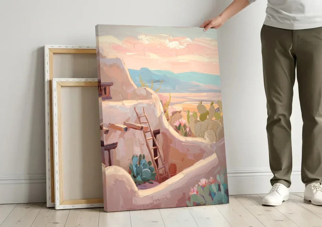 Santa Fe Adobe Architecture canvas wall art leaning against a wall next to blank canvases