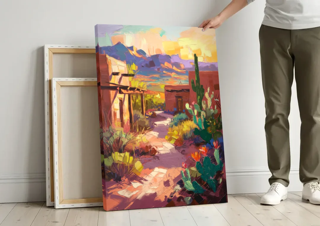 Santa Fe Desert Trail canvas wall art leaning against a wall next to blank canvases