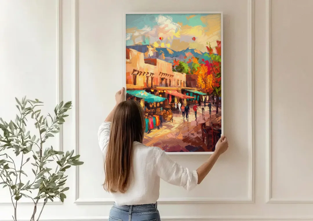 Santa Fe Historic Plaza canvas wall art being hung on a paneled wall