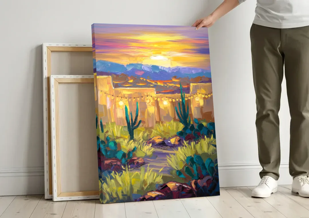 Santa Fe Sunlit Horizon canvas wall art leaning against a wall next to blank canvases