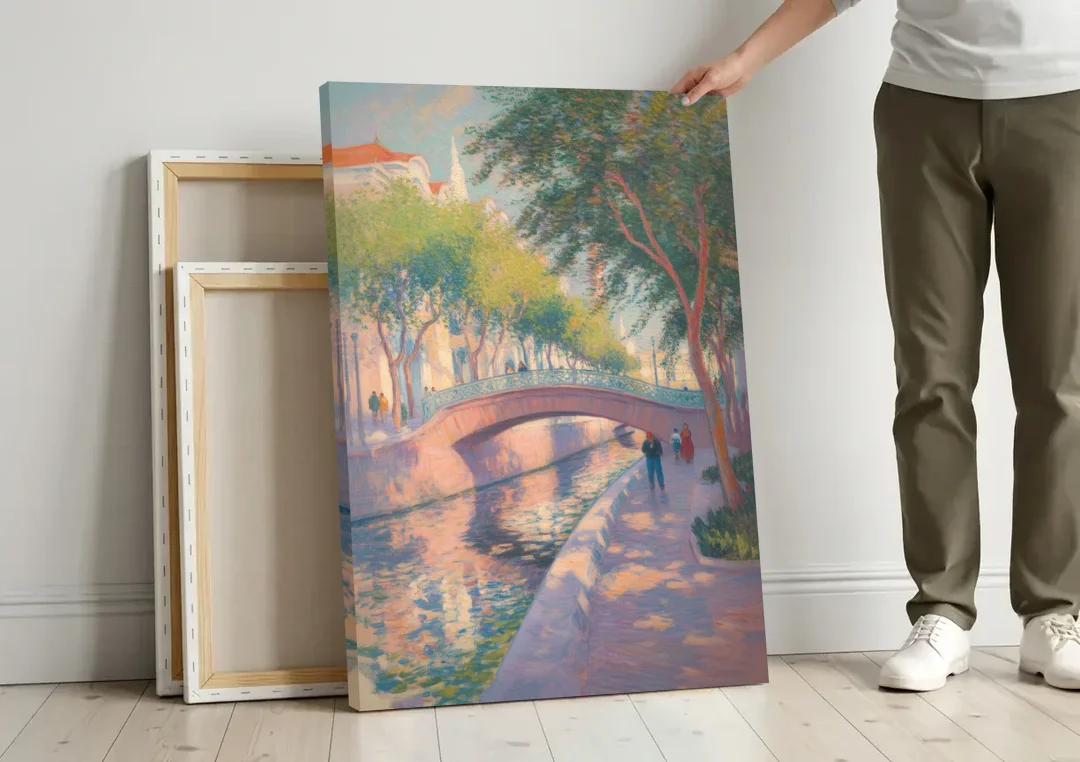 Santa Lucía Riverwalk canvas wall art leaning against a wall next to blank canvases