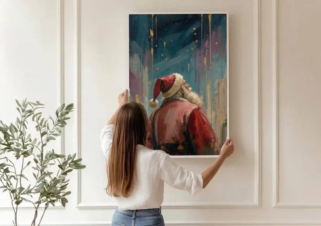 Contemporary Christmas Santa Under Gold Stars canvas wall art being hung on a paneled wall