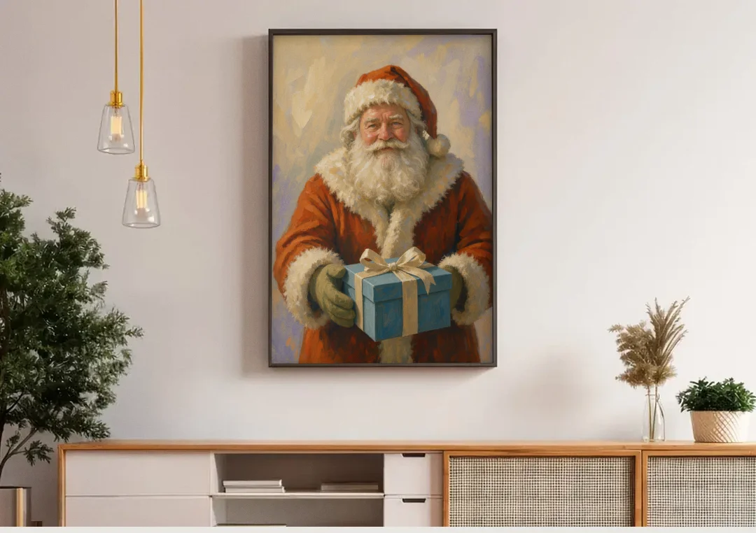 Framed Christmas Santa with the Blue Gift canvas wall art above a wooden sideboard under pendant lights