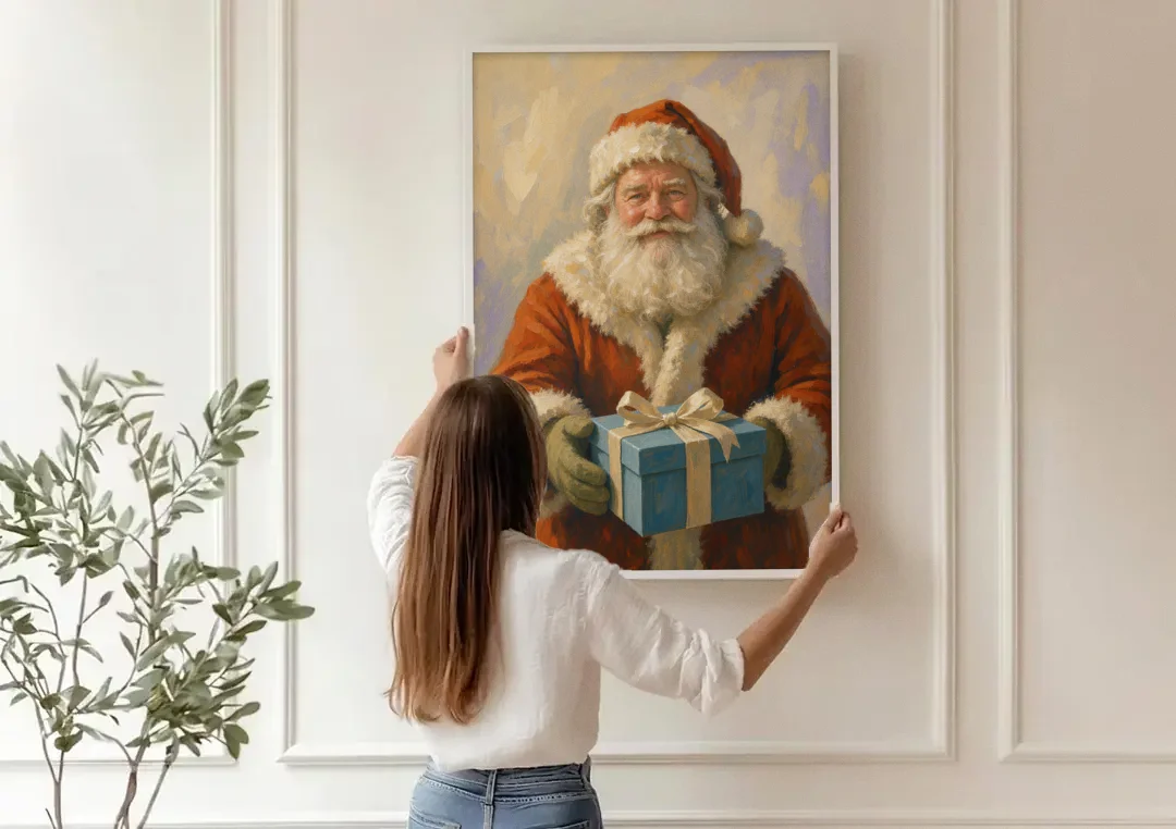 Framed Christmas Santa with the Blue Gift canvas wall art being hung on a paneled wall