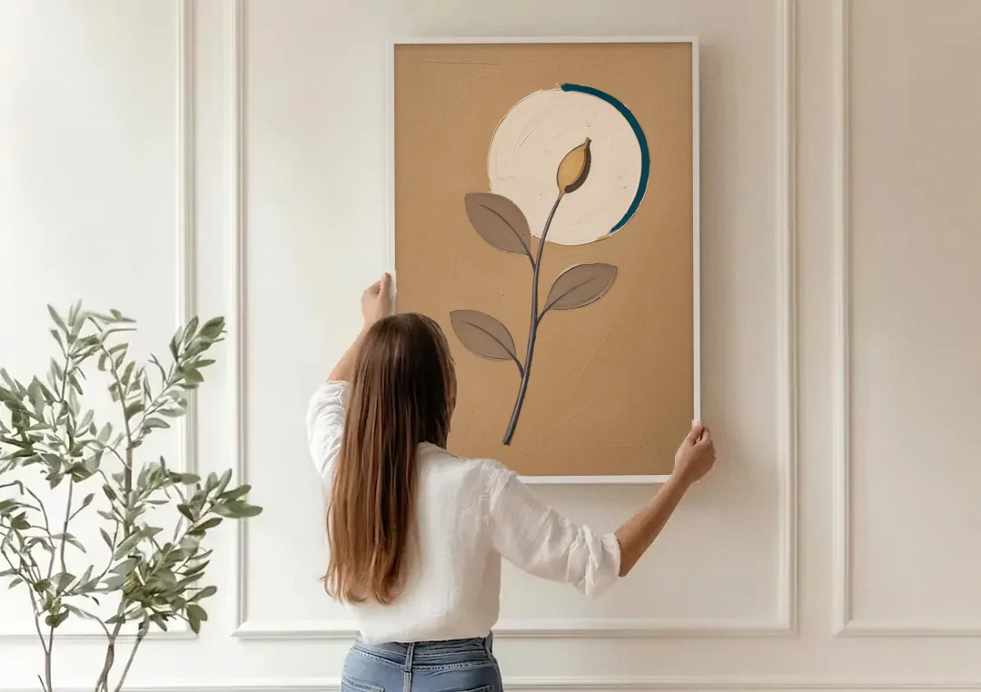 Scandinavian Abstract Wall Art Seed Pod and Cream Moon canvas wall art being hung on a paneled wall