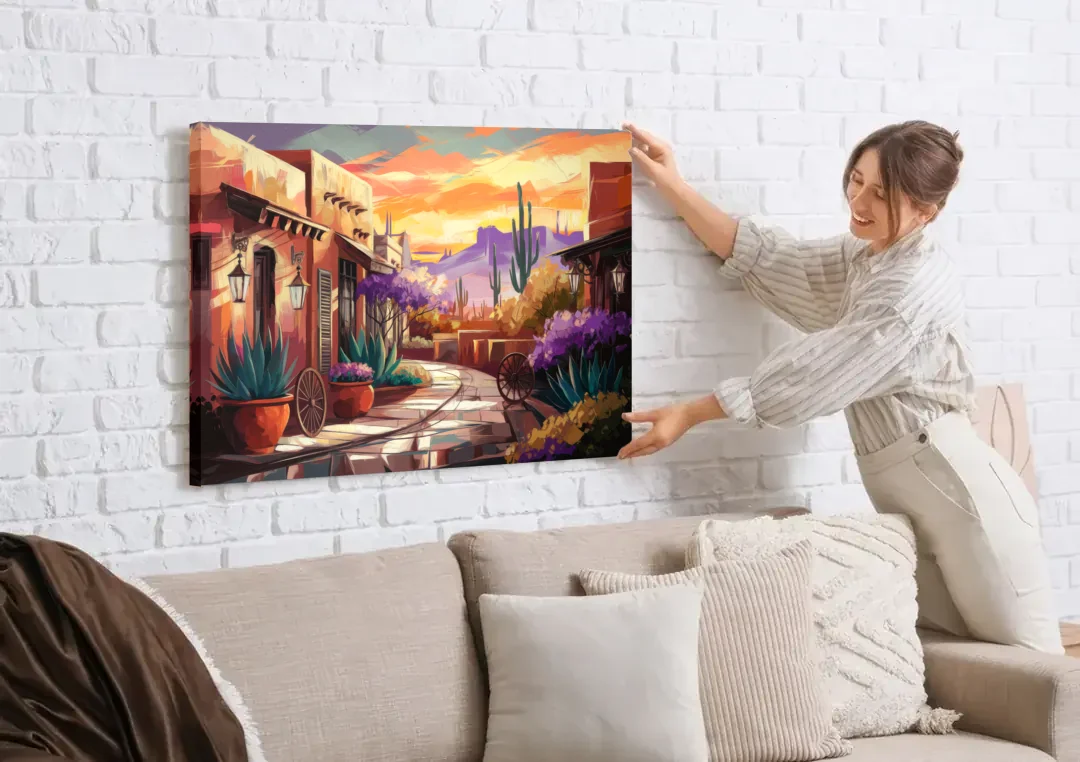 Scottsdale Old Town Charm canvas wall art being hung on a white brick wall above a sofa