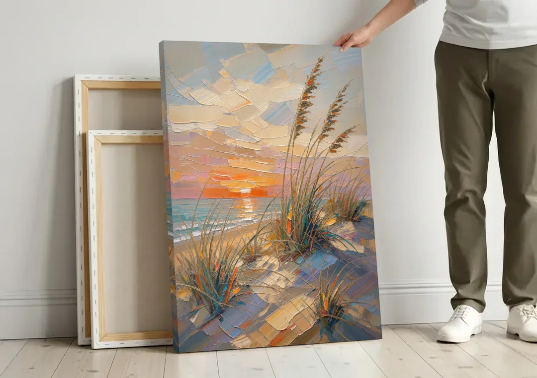Sea Grass Painting at Golden Hour canvas wall art leaning against a wall next to blank canvases