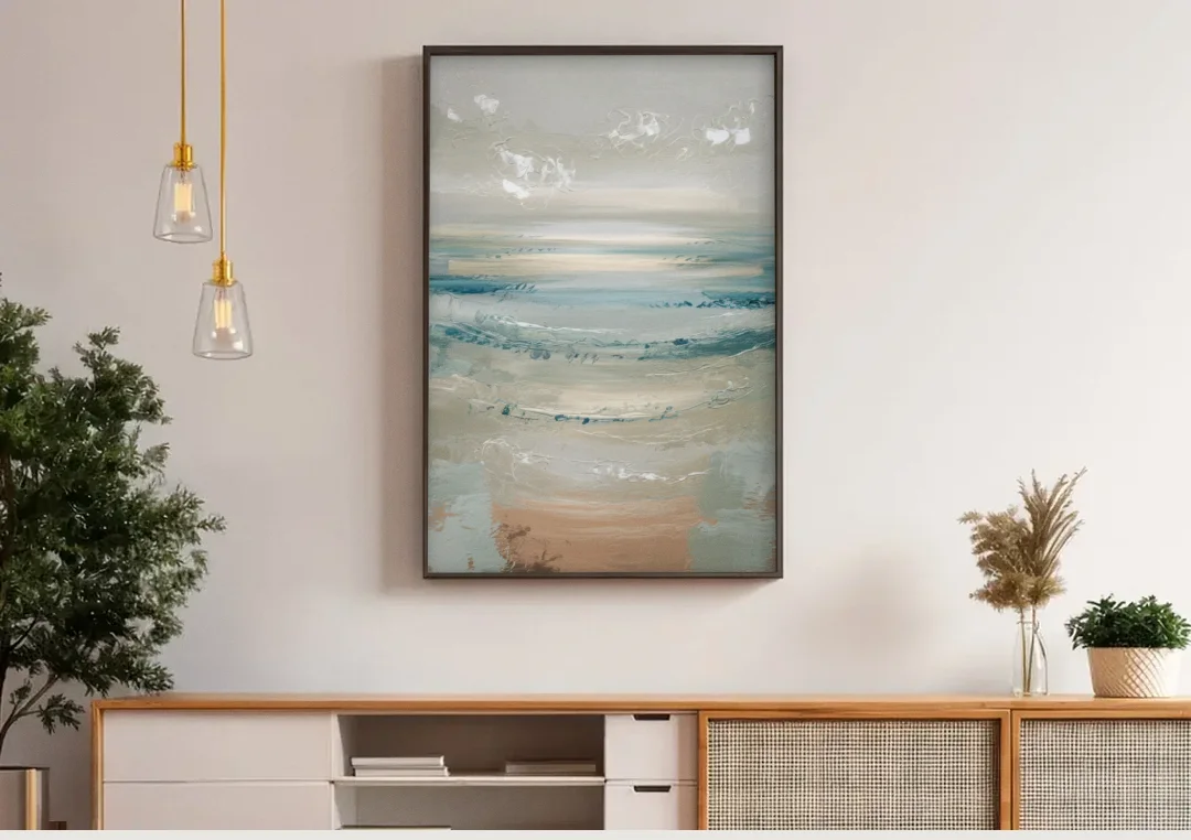 Seaside Blue Horizon canvas wall art above a wooden sideboard under pendant lights