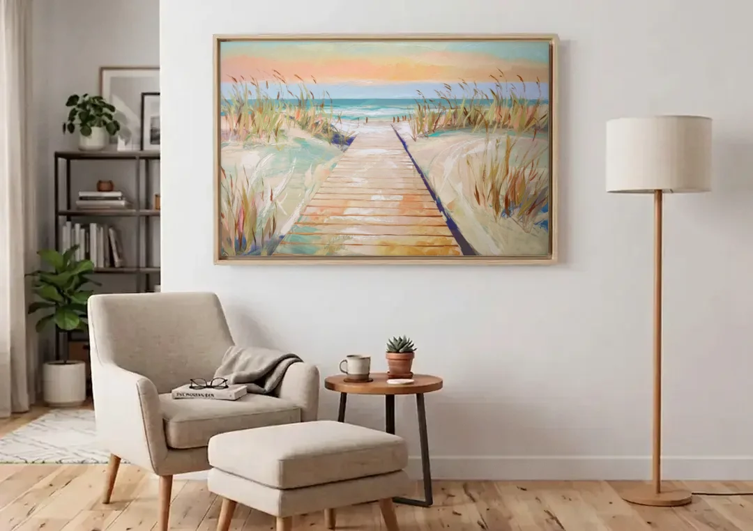 Seaside Boardwalk Dreams canvas wall art above an armchair in a bright living room