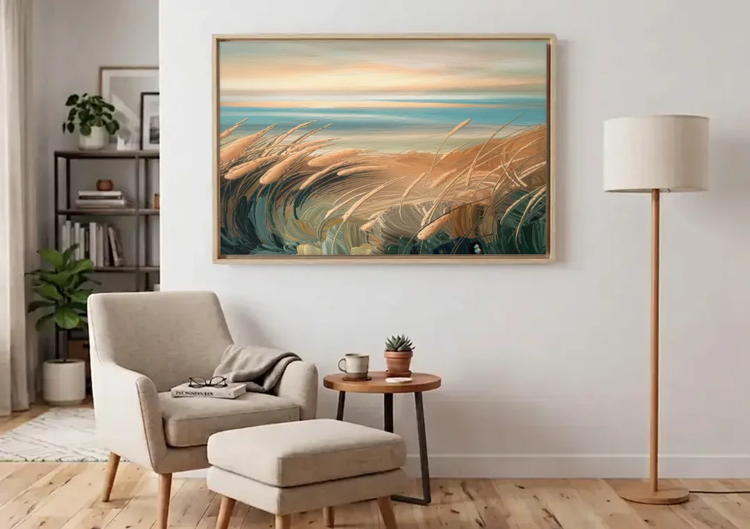 Seaside Dunes And Grass canvas wall art above an armchair in a bright living room