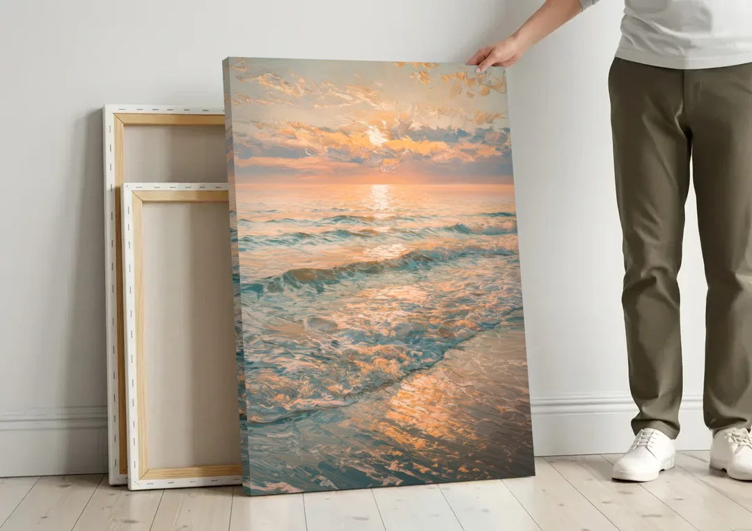 Seaside Golden Hour canvas wall art leaning against a wall next to blank canvases