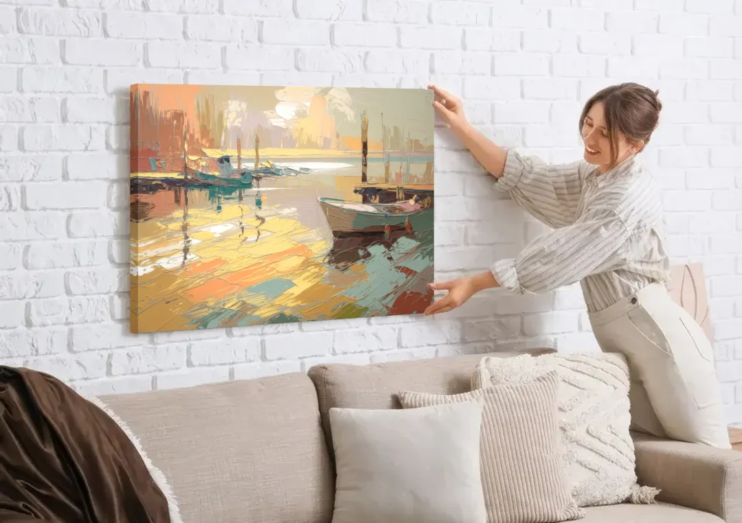 Seaside Harbor Reflections canvas wall art being hung on a white brick wall above a sofa