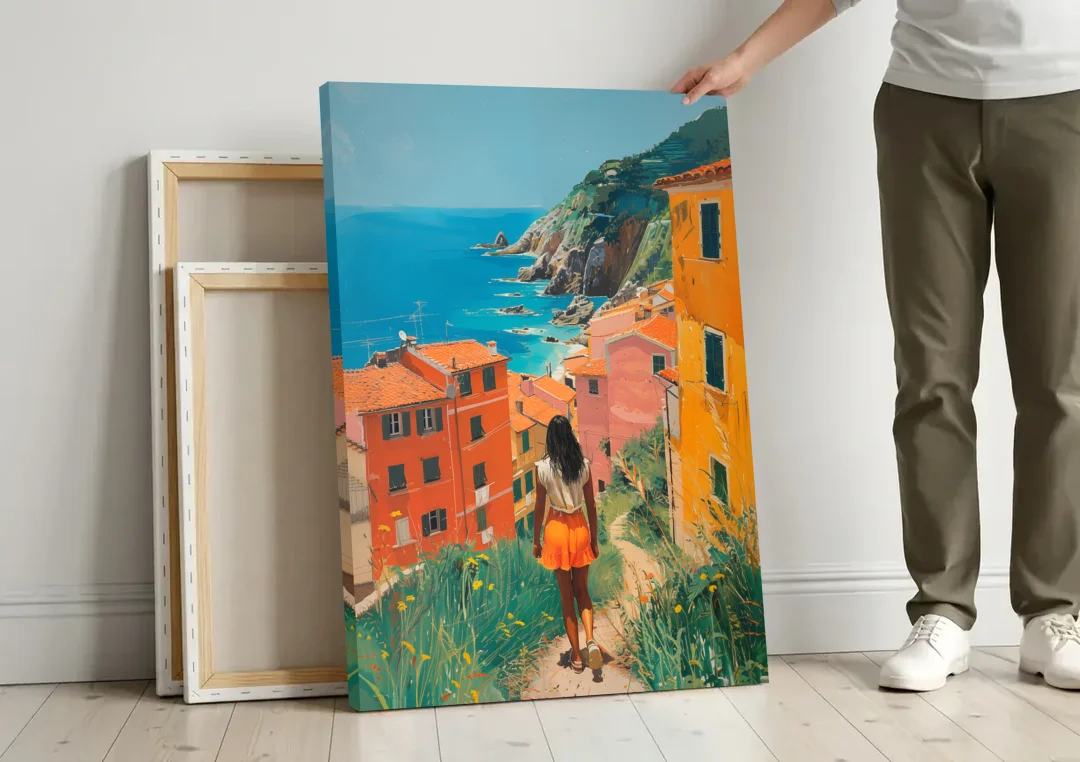 Seaside Painting of a Summer Walk canvas wall art leaning against a wall next to blank canvases