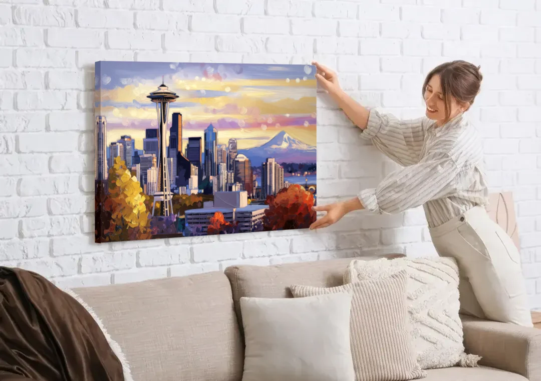 Seattle Iconic Landmarks canvas wall art being hung on a white brick wall above a sofa