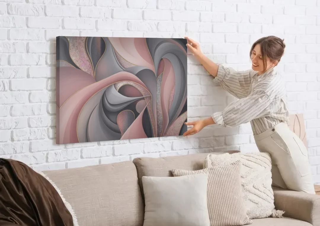 Serenade of Elegance Pink and Grey Abstract canvas wall art being hung on a white brick wall above a sofa