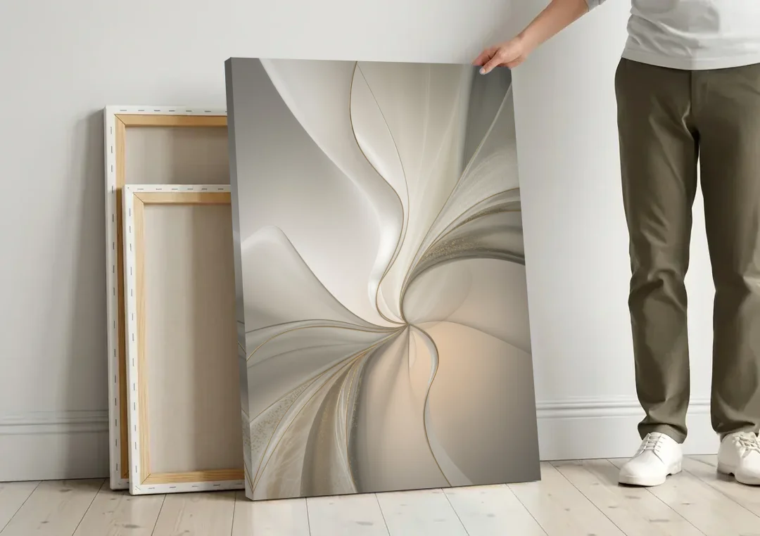 Serene Elegance in White Abstract canvas wall art leaning against a wall next to blank canvases