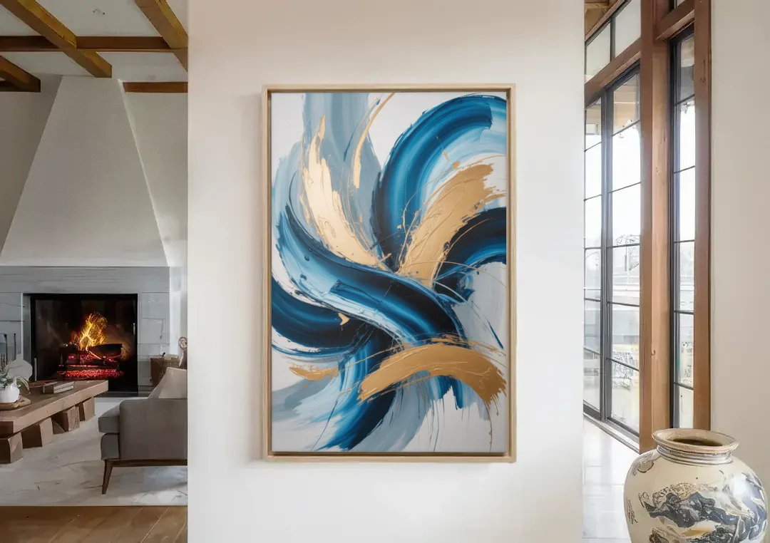 Serene Opulence Blue and Gold Abstract canvas wall art in a living room with a fireplace