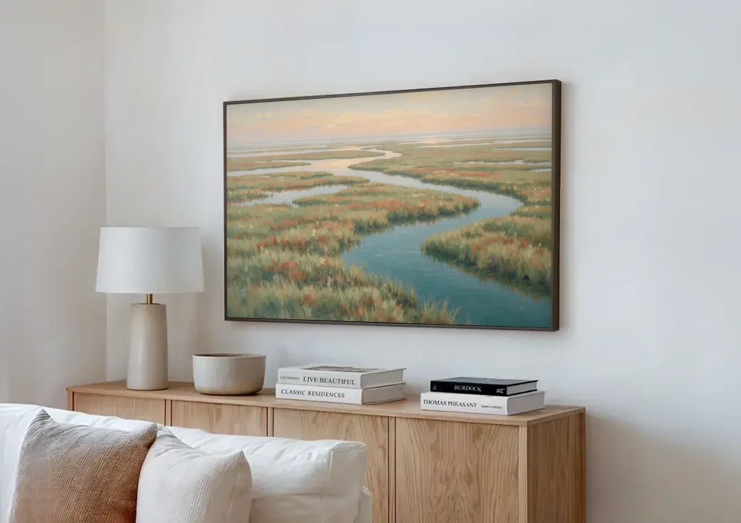 Serene Salt Marsh Creek at Morning canvas wall art above a wooden sideboard next to a sofa