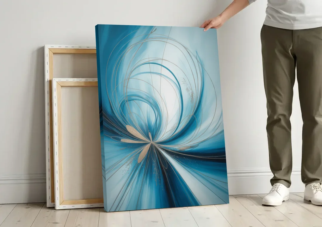 Serene Vortex Blue Abstract canvas wall art leaning against a wall next to blank canvases