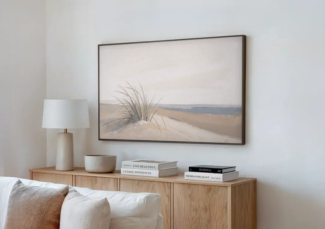 Set of 2 Wall Art with Windblown Dune Grass canvas wall art above a wooden sideboard next to a sofa