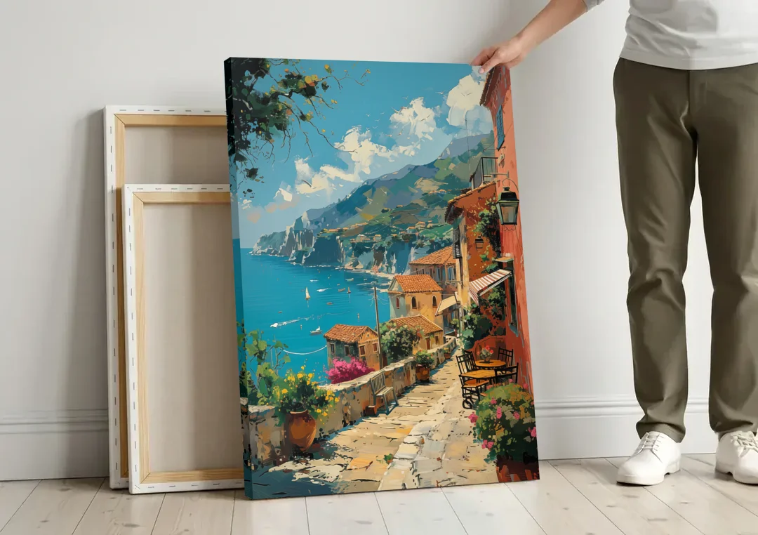 Sicily Painting of a Coastal Path canvas wall art leaning against a wall next to blank canvases