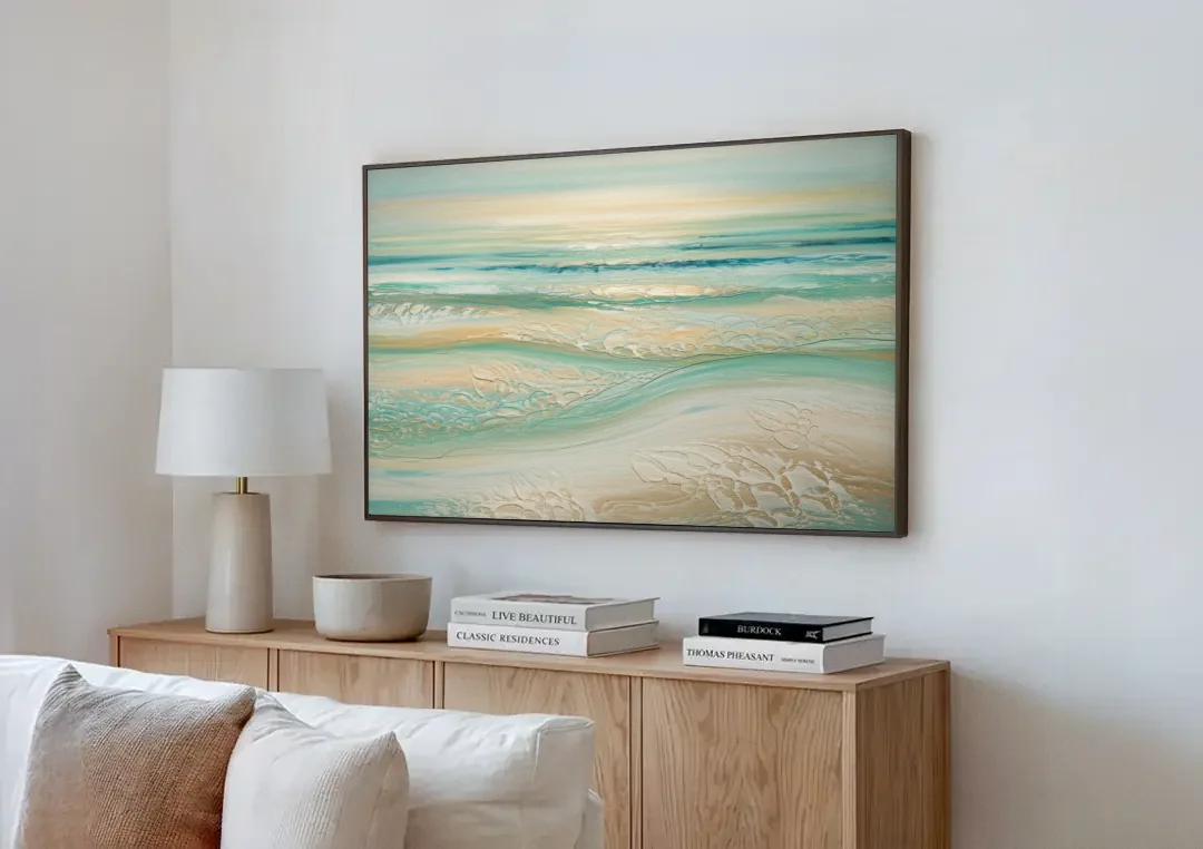 Sitka Ocean Breeze canvas wall art above a wooden sideboard next to a sofa
