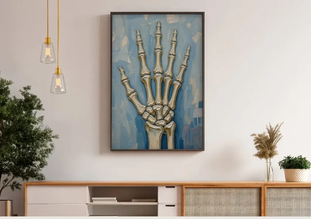 Skeleton Hand Painting Spread Wide Open canvas wall art above a wooden sideboard under pendant lights