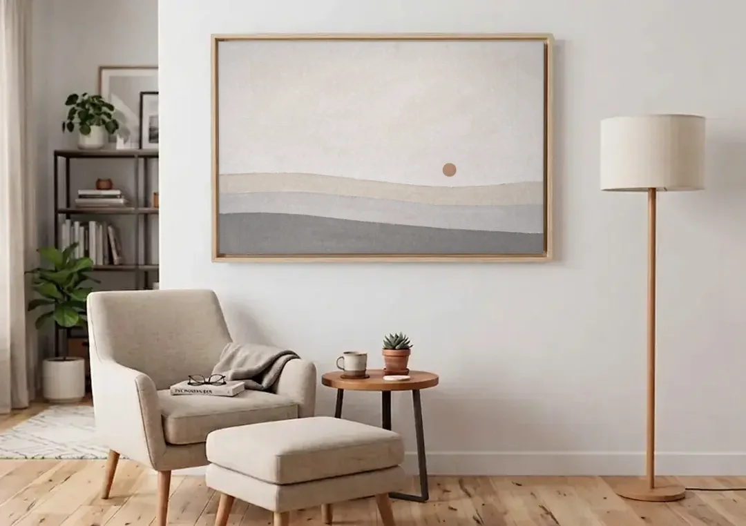 Small Sun Above Three Bands of Rolling Hills canvas wall art above an armchair in a bright living room