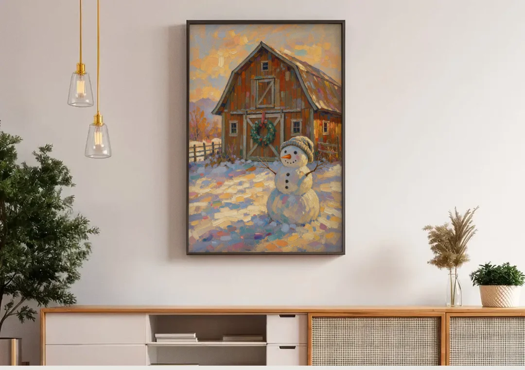 Snowman by the Red Barn with Wreath canvas wall art above a wooden sideboard under pendant lights